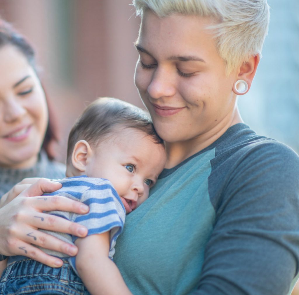 Couple Holding Baby