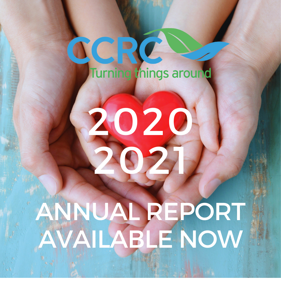 CCRC's 2020 2021 Annual Report is available now. Image is of childs hands holding an image of a heart on top of adults hands with the CCRC logo on a faded blue background