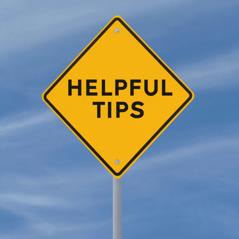 Sign that reads 'helpful tips' against a blue sky background